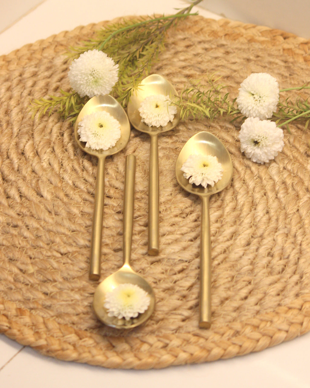 stainless steel spoon with round handle premium gold finish . 